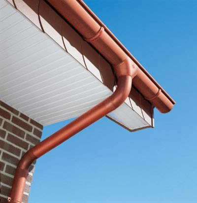 A brick home with European copper gutters.